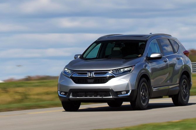 Private chauffeur and minivan for your tours or business needs. - Building a Day from Coast to Mountain